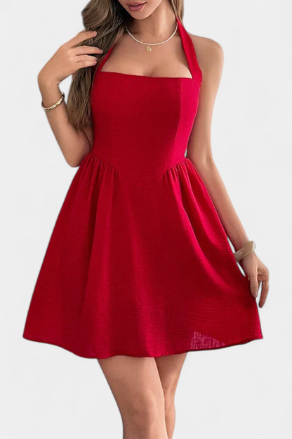 Kassandra Vestido Mini Halter con Espalda Abierta y Bolsillos